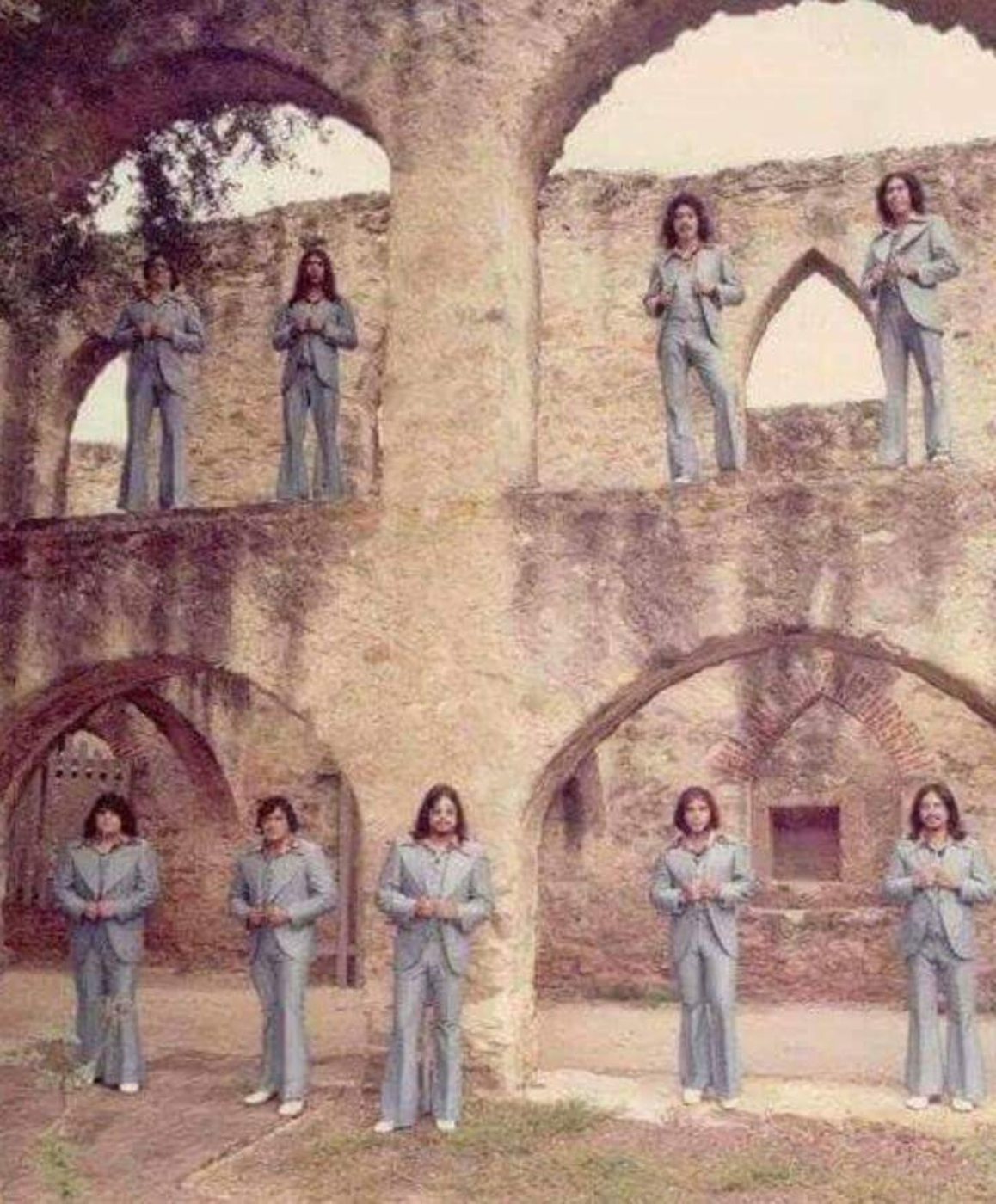 The Latin Breed posed at a historic mission