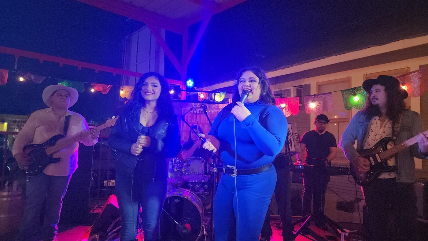 Young Tejano artists performing on stage