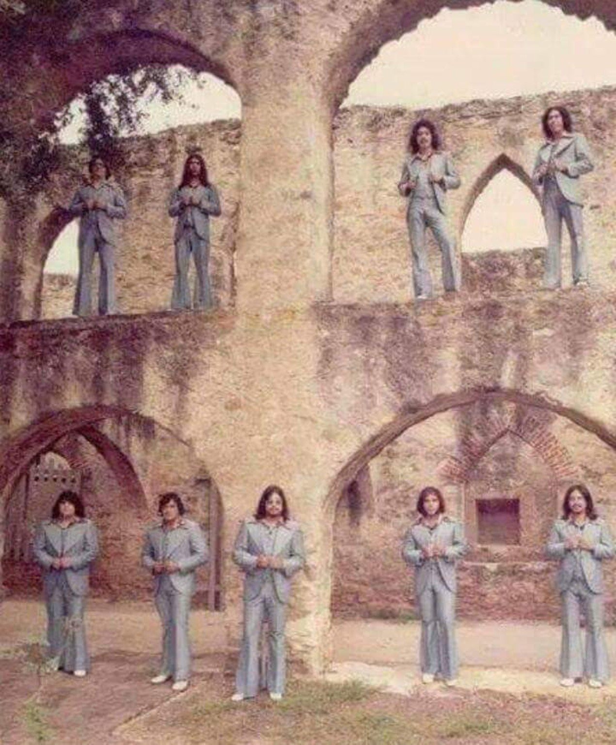 Vintage Tejano band publicity photo taken at historic mission arches