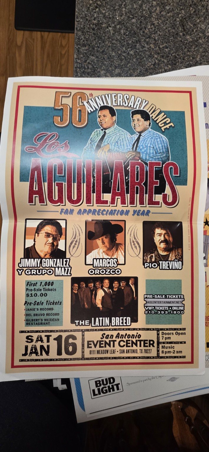 Historic Tejano concert poster laid out for documentation